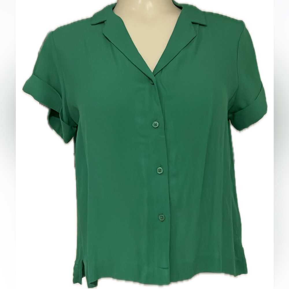 Green button down Cropped Bowler shirt with cuffed sleeves.